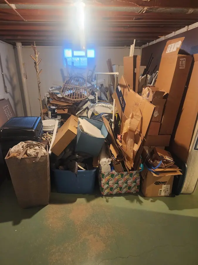 Roll-off dumpster container at job site for Yard Waste Dumpster Rental in Harbour Heights